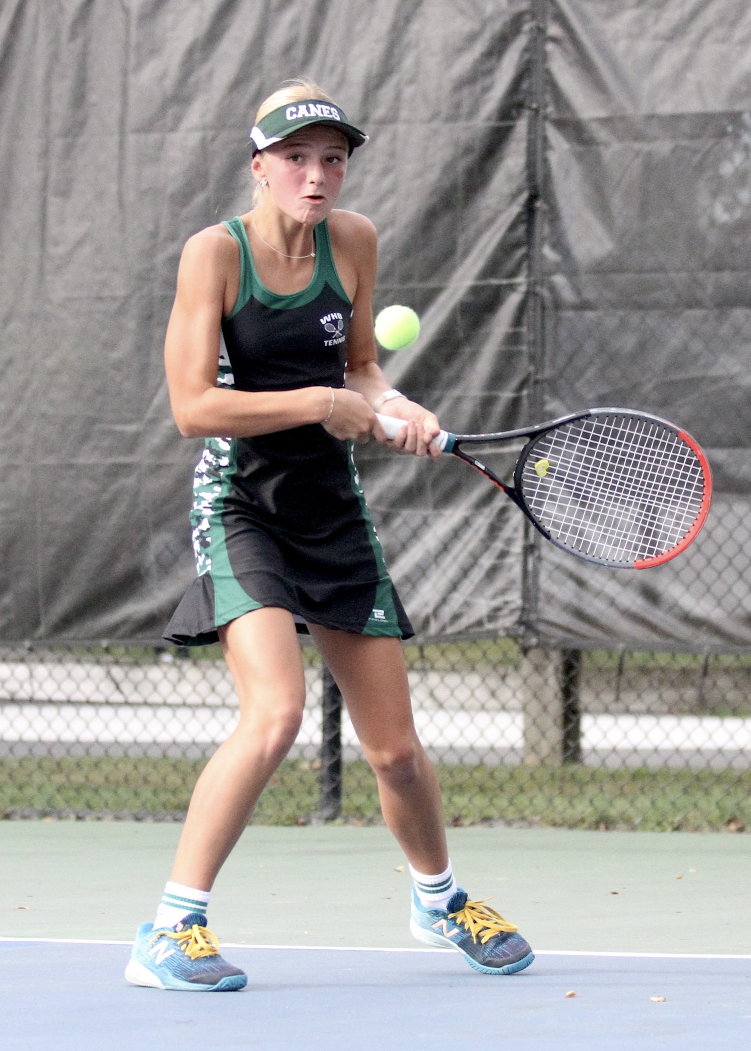 Seventh-grader Riley Magner connects with the ball. DESIRÉE KEEGAN