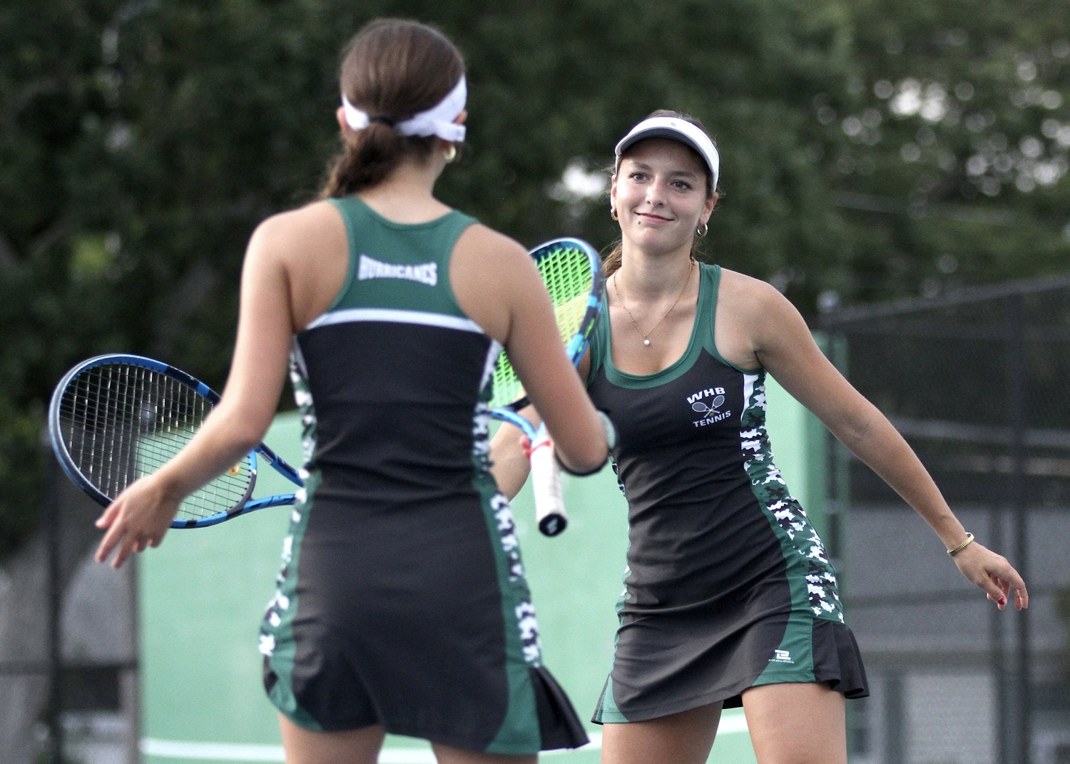 Junior Zoë Grellet-Aumont celebrates a point. DESIRÉE KEEGAN
