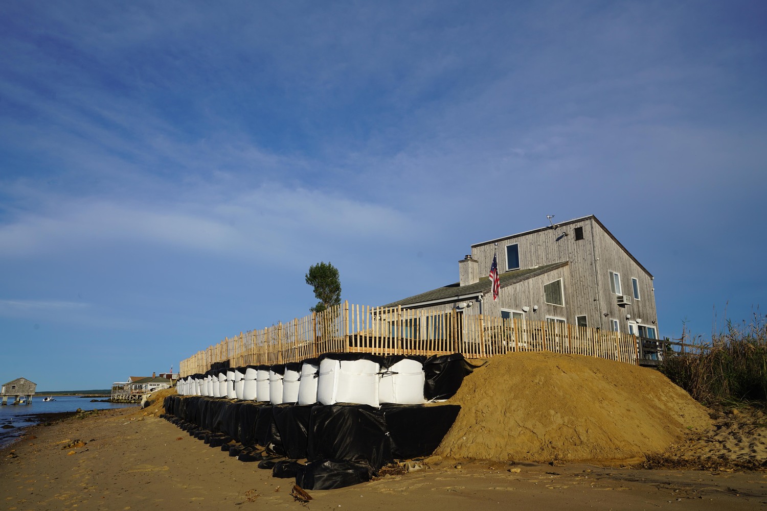 Since 2018, a Napeague homeowner has protected his house with controversial GeoCubes, which have blocked beach access for neighbors. The East Hampton Town Building Department recently signed off on the installation of new ones. DOUG KUNTZ