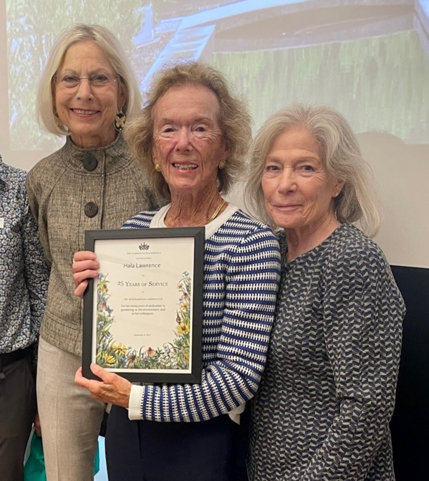 Westhampton Garden Club presented two  awards at its recent meeting.  First Vice-President and Gardens Chair Peggy Veziris received the Club Appreciation Award for her tireless support and mentoring of WGC members' conservation and preservation efforts, as well as overseeing the five public gardens that the club established and maintains in Westhampton and Quogue.  Hala Lawrence received the Years of Service Award for 25 years of dedication to ecological gardening and support of her colleagues. She also was elected an honorary member  of the club upon her  retirement. Joy Flynn , left, and Anne Moore Hutton, award committee members, congratulate Hala Lawrence.  COURTESY LYNDA CONFESSORE