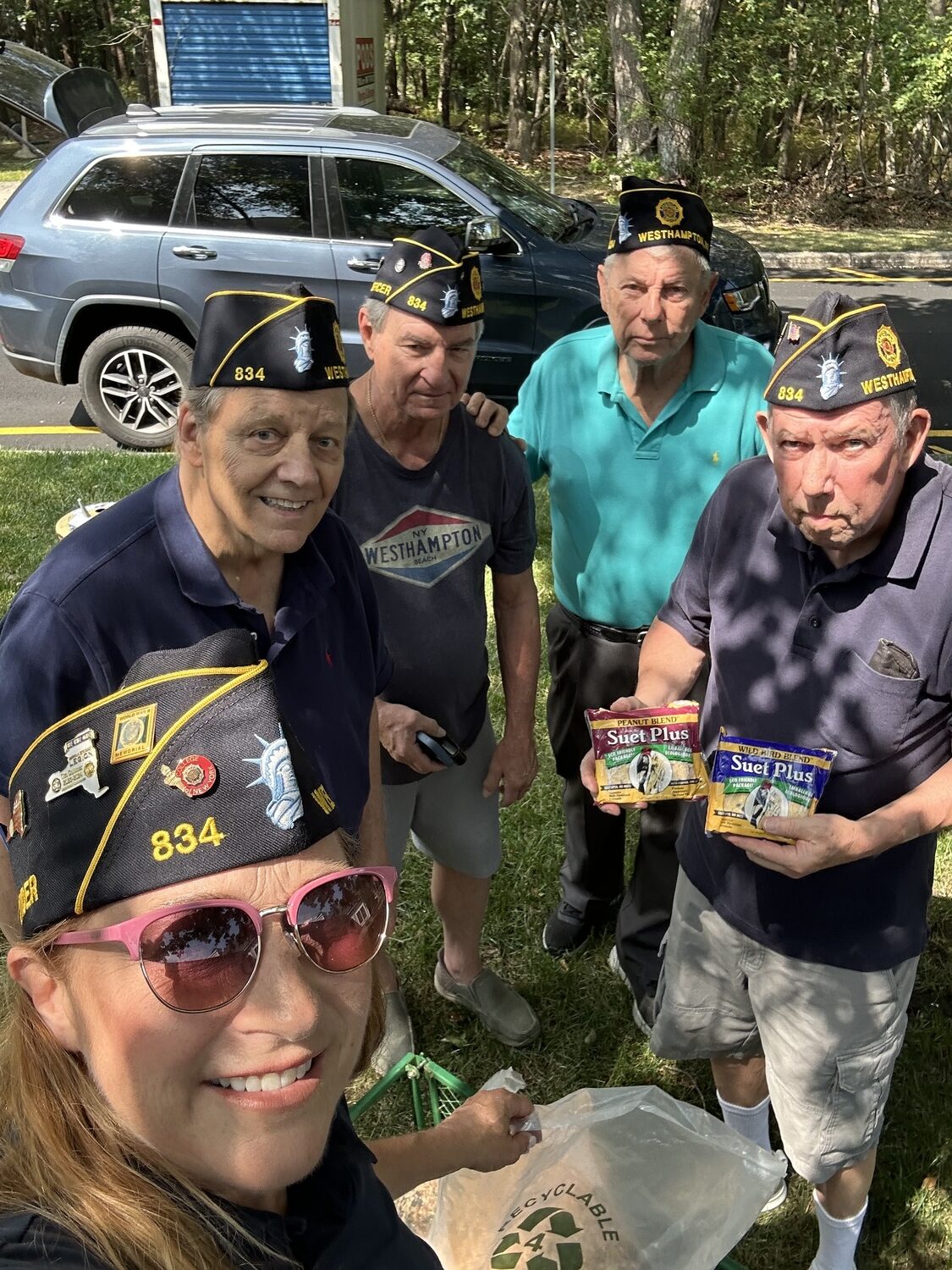 Members of the Westhampton American Legion -- Lisha Terry/Sandy Wyman/Mike Berdinda/Tom Hadlock/Tom Quinn -- took time recently to feed the birds at the Westhampton Care Center. COURTESY TOM HADLOCK
