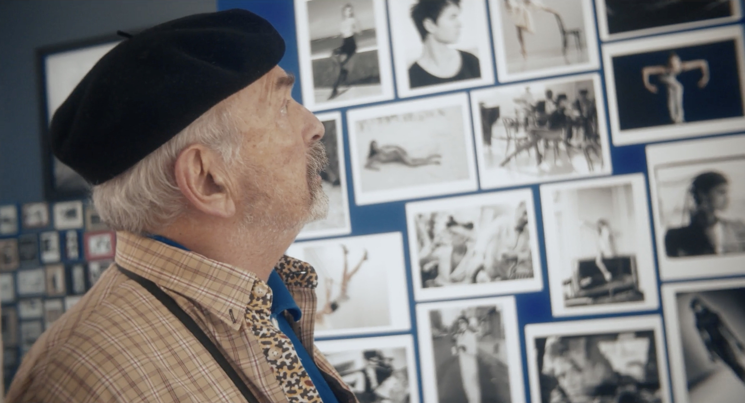 Fashion photographer Arthur Elgort looks at a wall filled with his work. WARREN ELGORT/