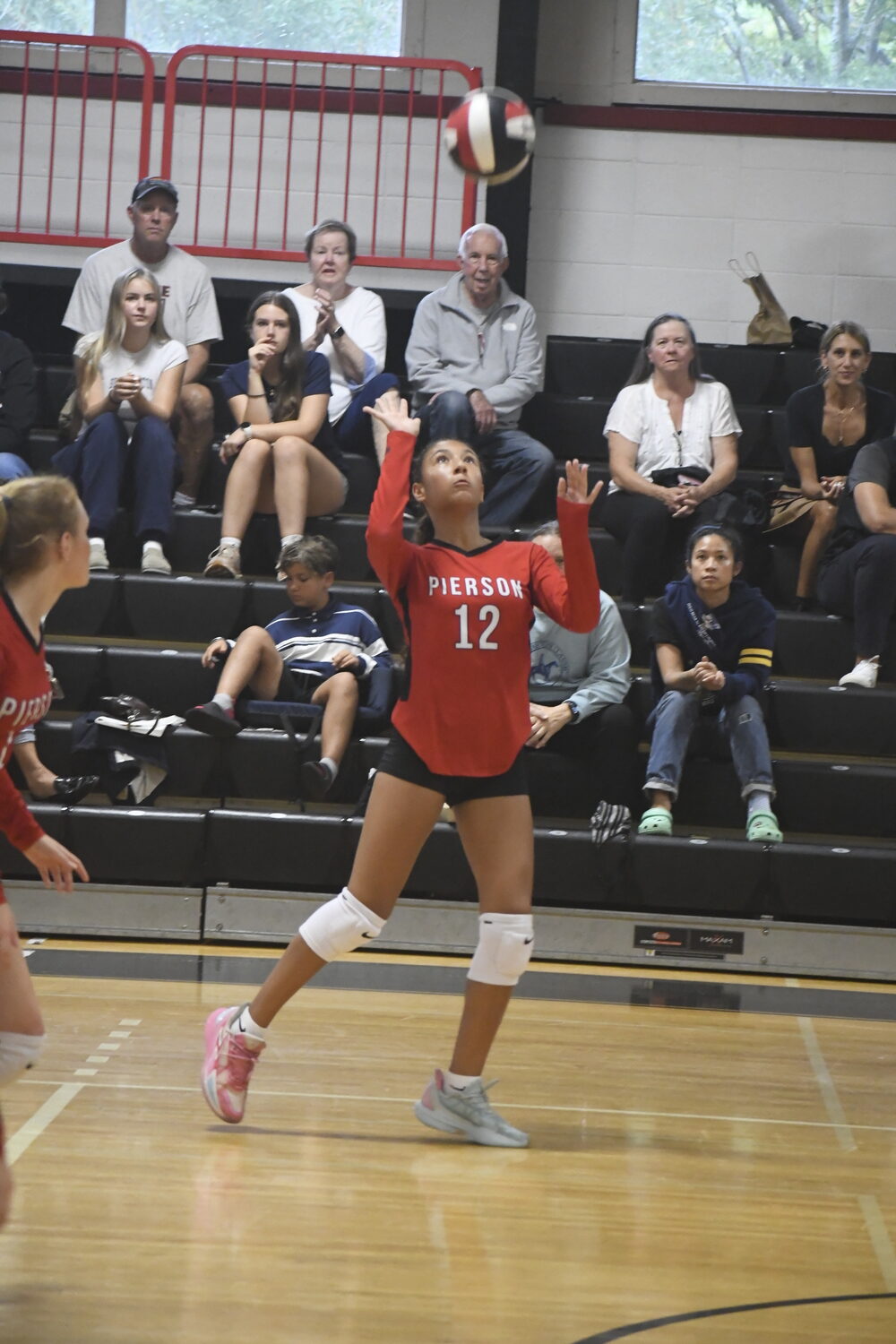 Sophomore Destiny Parker looks to hit the ball back over the net. DREW BUDD
