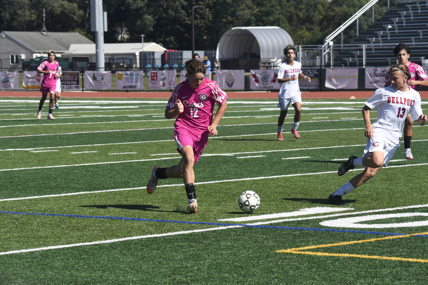 Westhampton Beach sophomore Adam Gibas brings the ball into Bellport's defensive third.  DREW BUDD