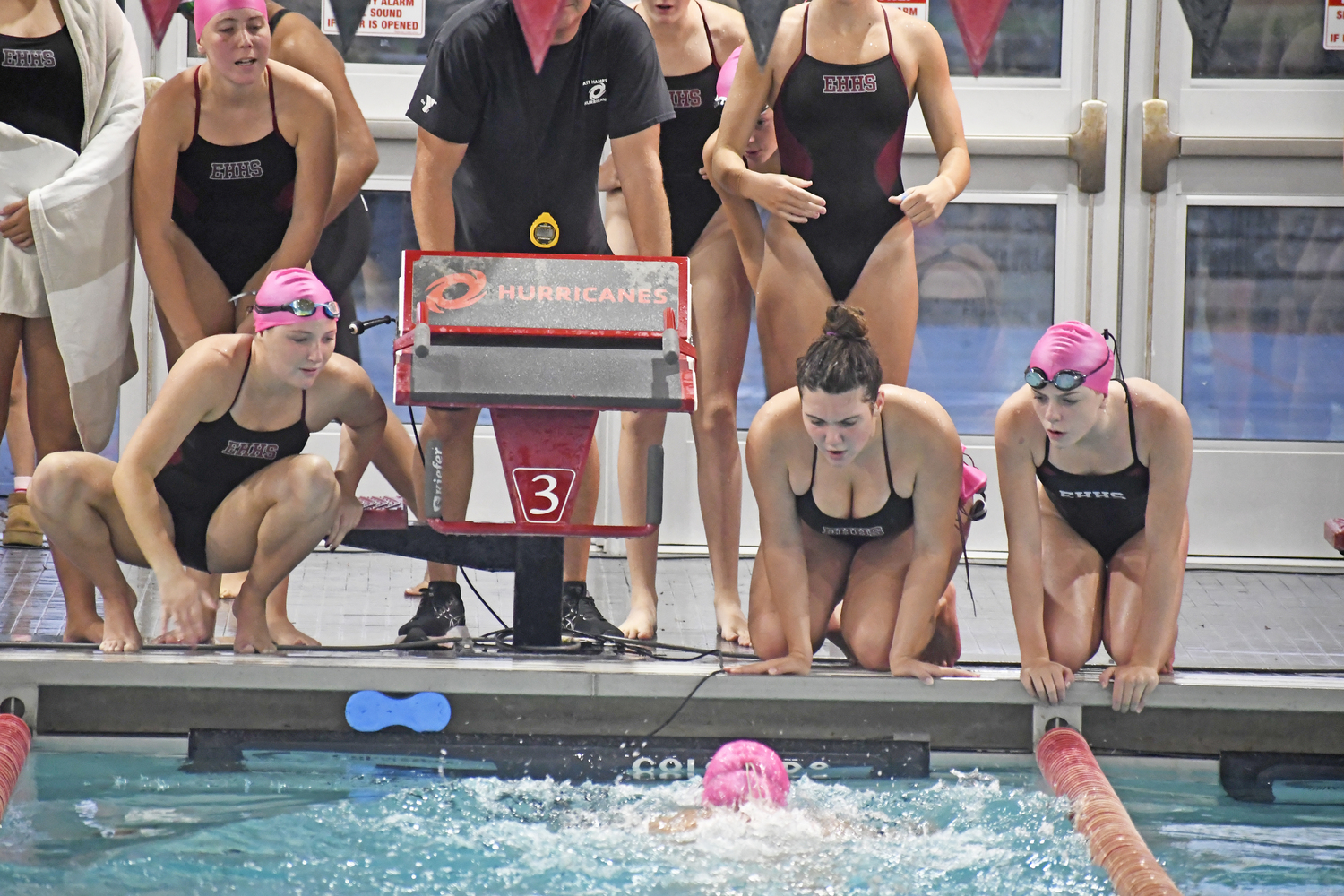 The Bonackers cheer on a teammate in a League II meet against Half Hollow Hills/Kings Park on October 8.  DREW BUDD
