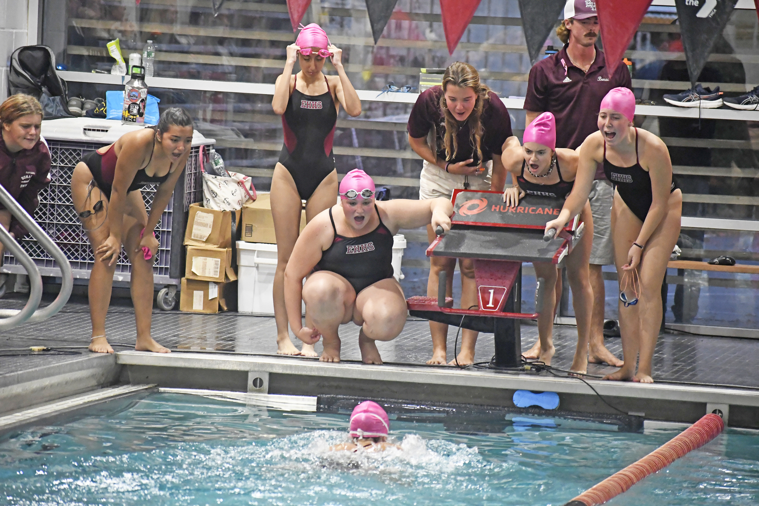The Bonackers cheer on a teammate in a League II meet against Half Hollow Hills/Kings Park on October 8.  DREW BUDD