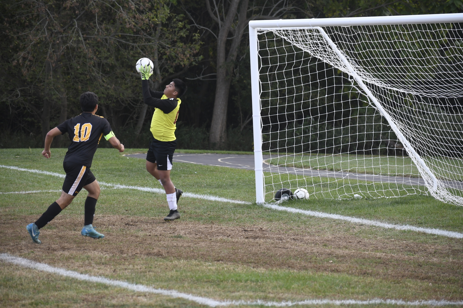 Pierson junior goalie Esteban Montanez makes a save.  DREW BUDD