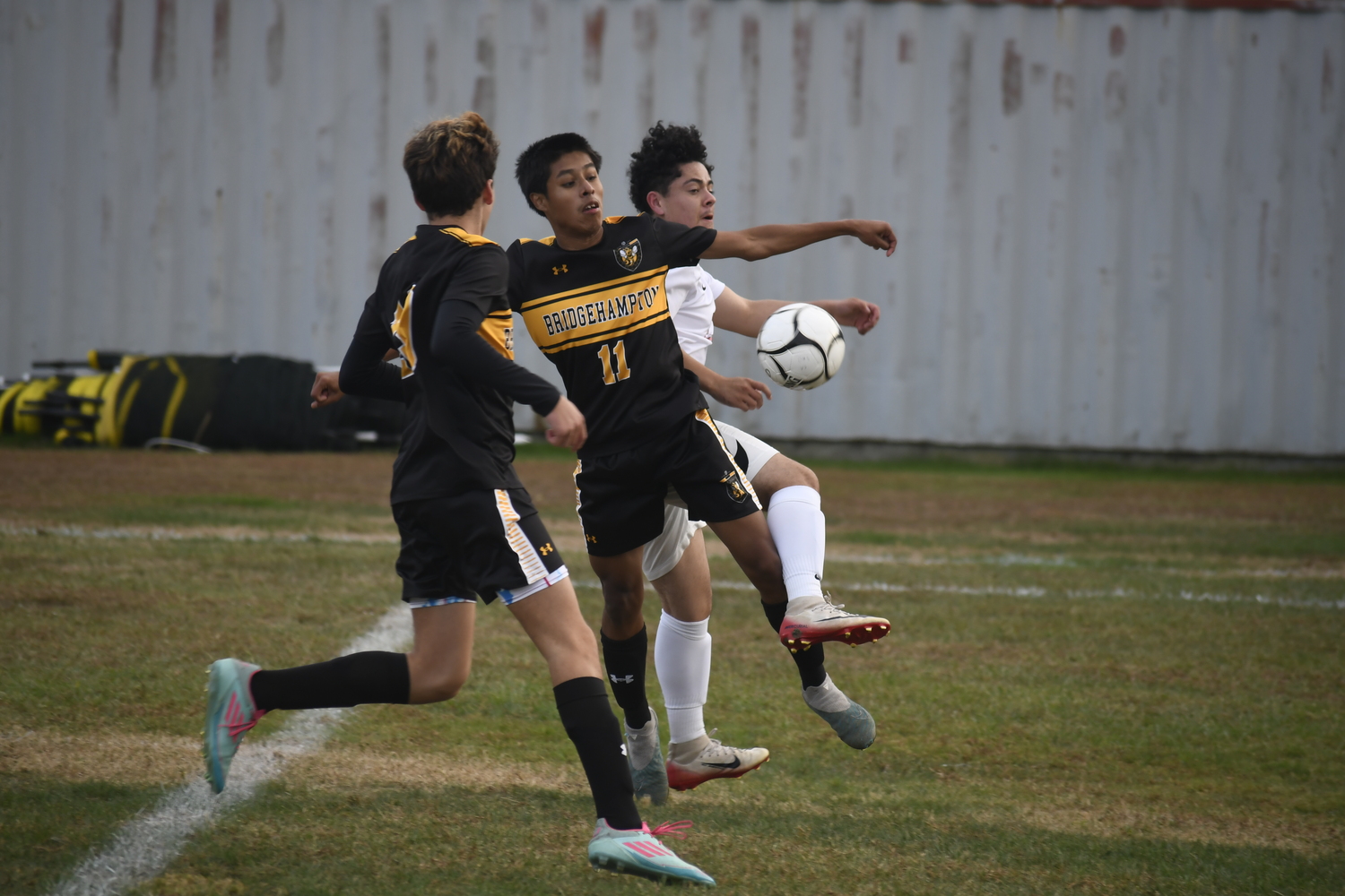 Bridgehampton sophomore Steven Lucero Morocho and Pierson senior Samuel Rosero converge on a loose ball. DREW BUDD