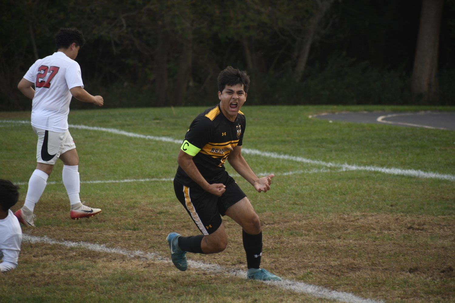Bridgehampton senior co-captain Luis Penafiel is fired up after scoring the game's first goal on Friday.  DREW BUDD