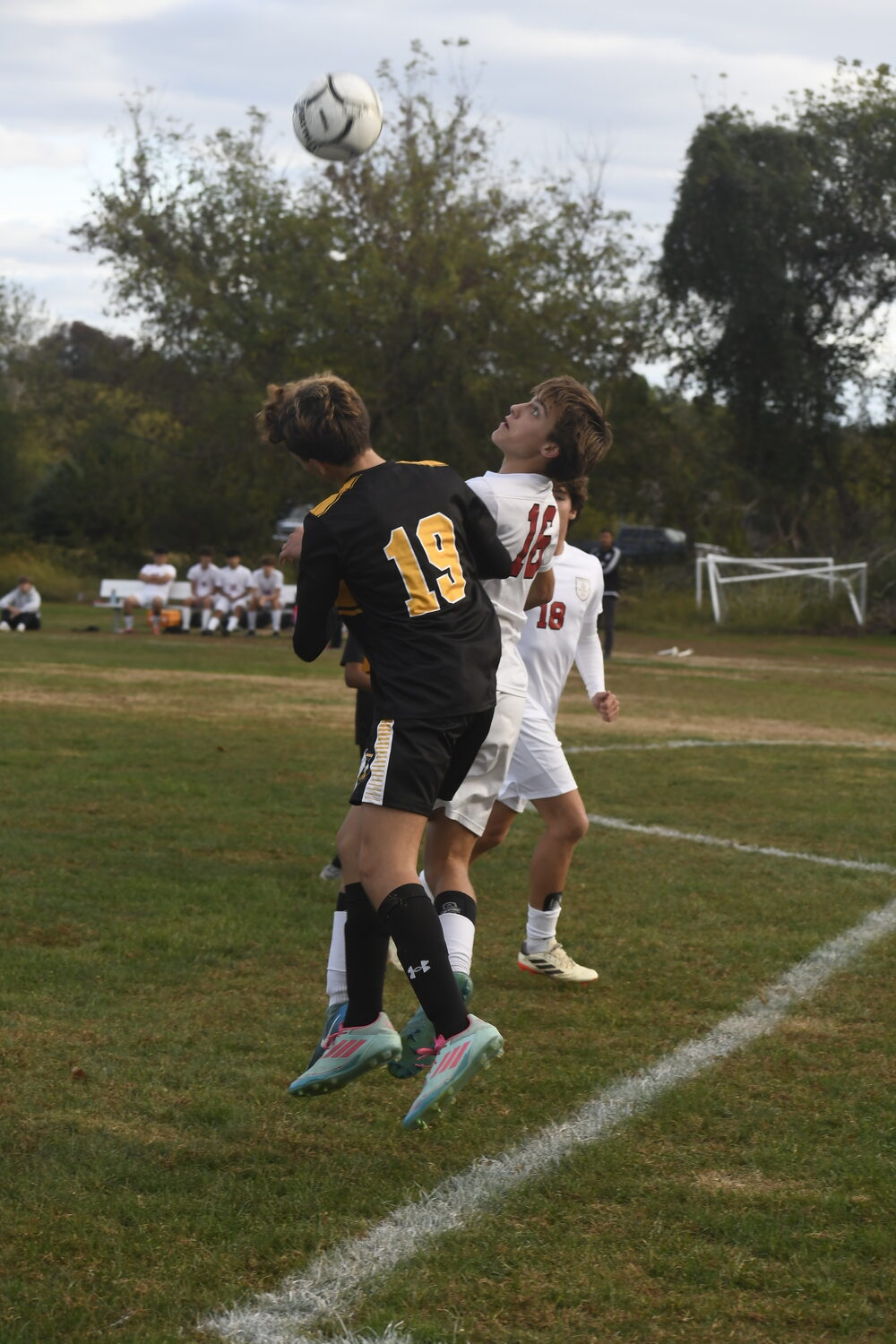 Bridgehampton freshman Nate Feierstein and Pierson freshman Emmett Schumann go up for the ball.  DREW BUDD