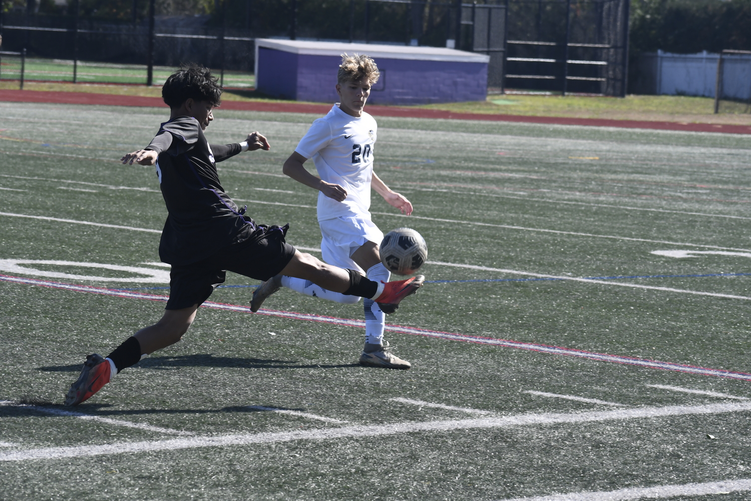 Hampton Bays senior Josue Guzman tries to settle the ball with the top of his foot.  DREW BUDD