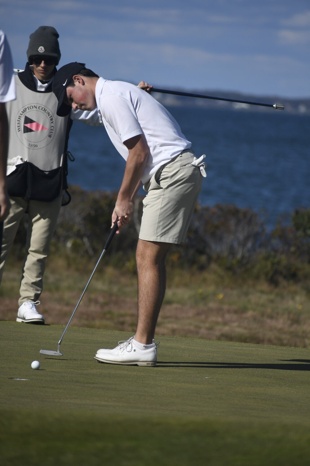 Westhampton Beach senior Zach Berger putts.  DREW BUDD