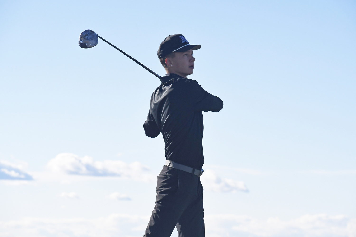 John Tedesco of Hampton Bays tees off on the final hole at Sebonack on Friday.  DREW BUDD