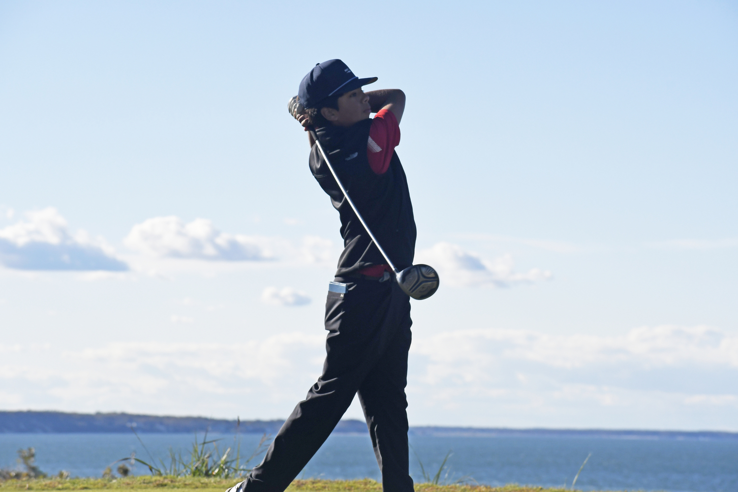 Pierson's Theo Venkatesh tees off on the final hole at Sebonack on Friday.  DREW BUDD