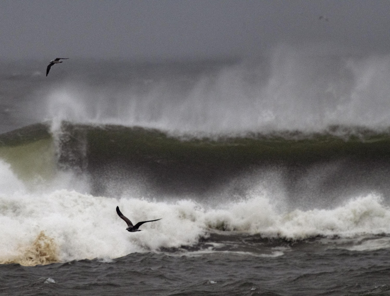 he ocean waves start to build at East Hampton Village Main Beach Monday afternoon.    DOUG KUNTZ
