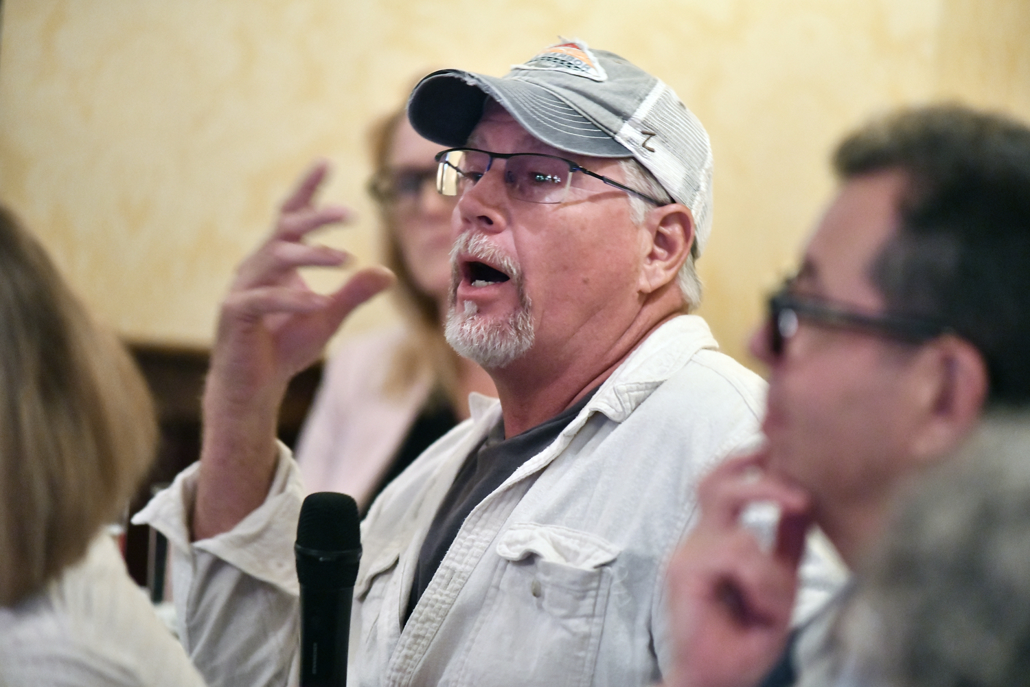 Audience member Ray Pettigrew makes a point.  DANA SHAW