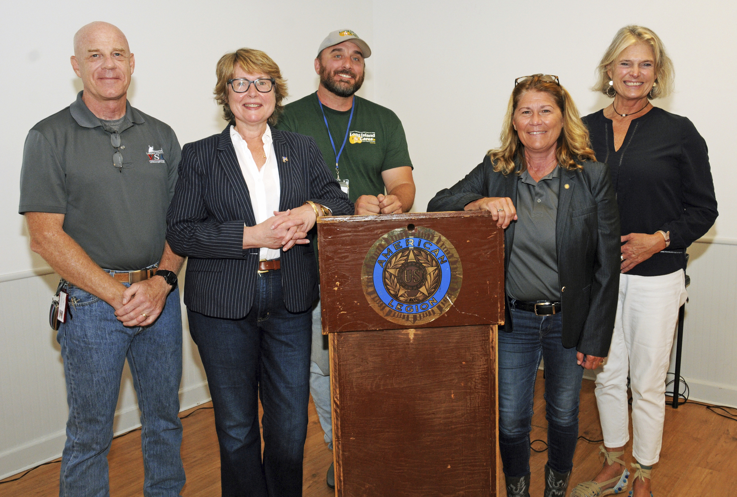 Suffolk County Veterans Services Agency Deputy Director James C. Brennan, Colonel USMC (Ret), East Hampton Town Supervisor Kathee Burke-Gonzalez, Long  Island Cares Veteran Outreach Coordinator Justin Berbig, Suffolk County Veterans Service Agency Director Marcelle Leis, Chief Master Sergeant (Ret) USAF and Suffolk County Legislator Anne Welker at the Suffolk County Veterans Resource Fain on Saturday at East Hampton American Legion Post 419 in Amagansett.  RICHARD LEWIN
