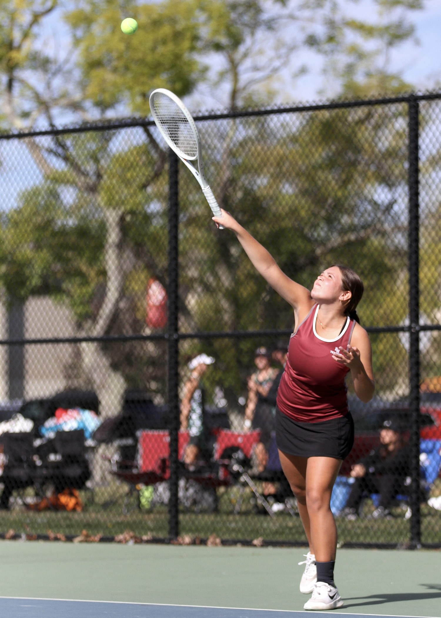 East Hampton freshman Fallon Centalonza serves. DESIRÉE KEEGAN