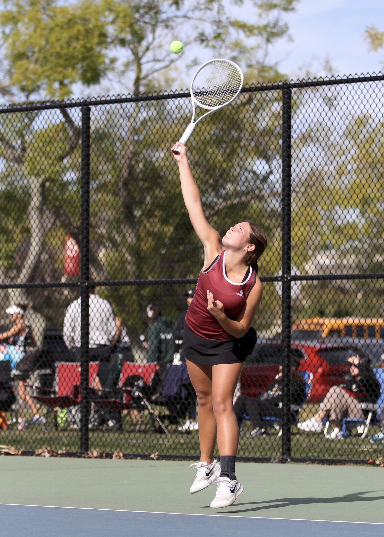 East Hampton freshman Fallon Centalonza serves. DESIRÉE KEEGAN