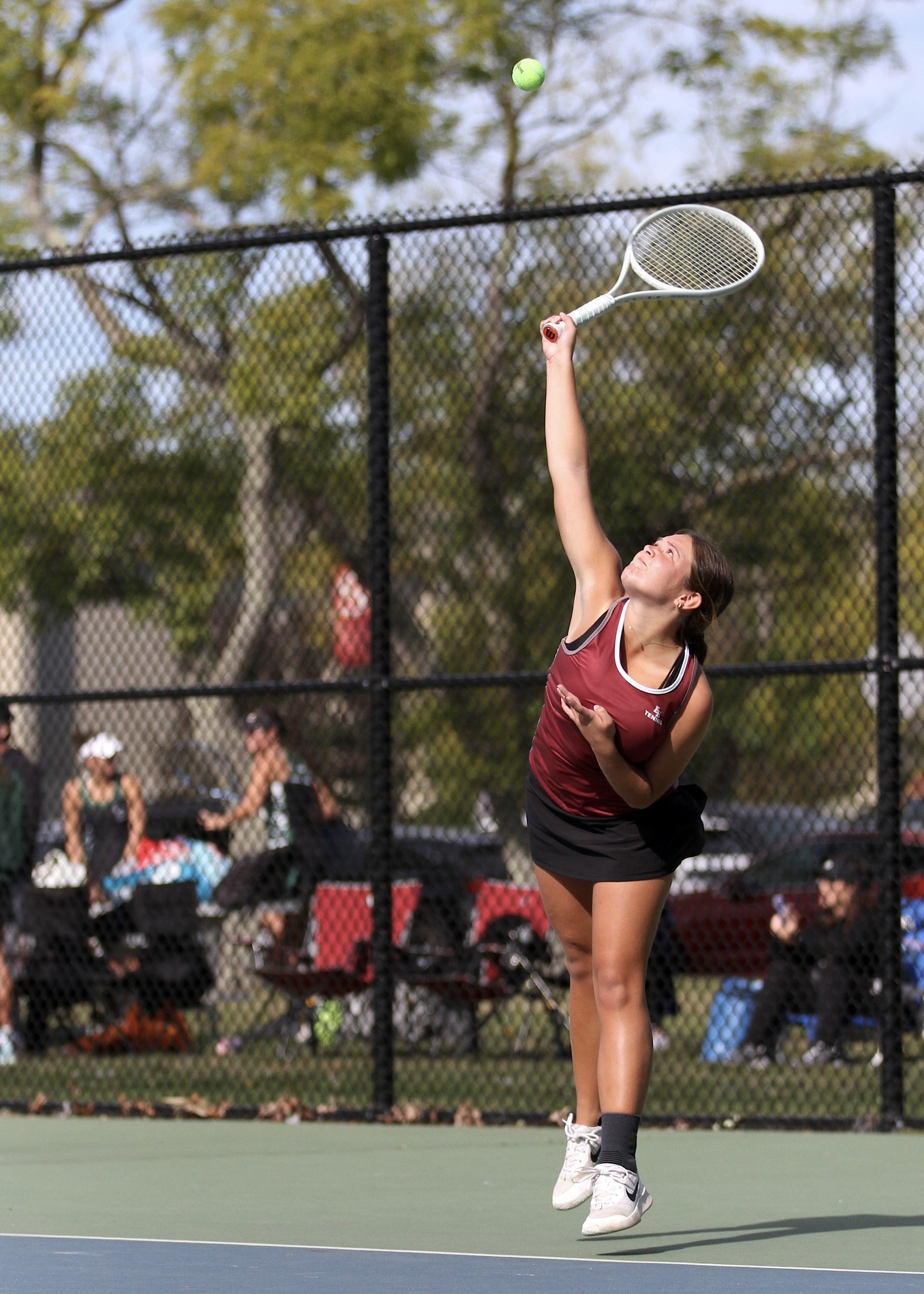 East Hampton freshman Fallon Centalonza serves. DESIRÉE KEEGAN