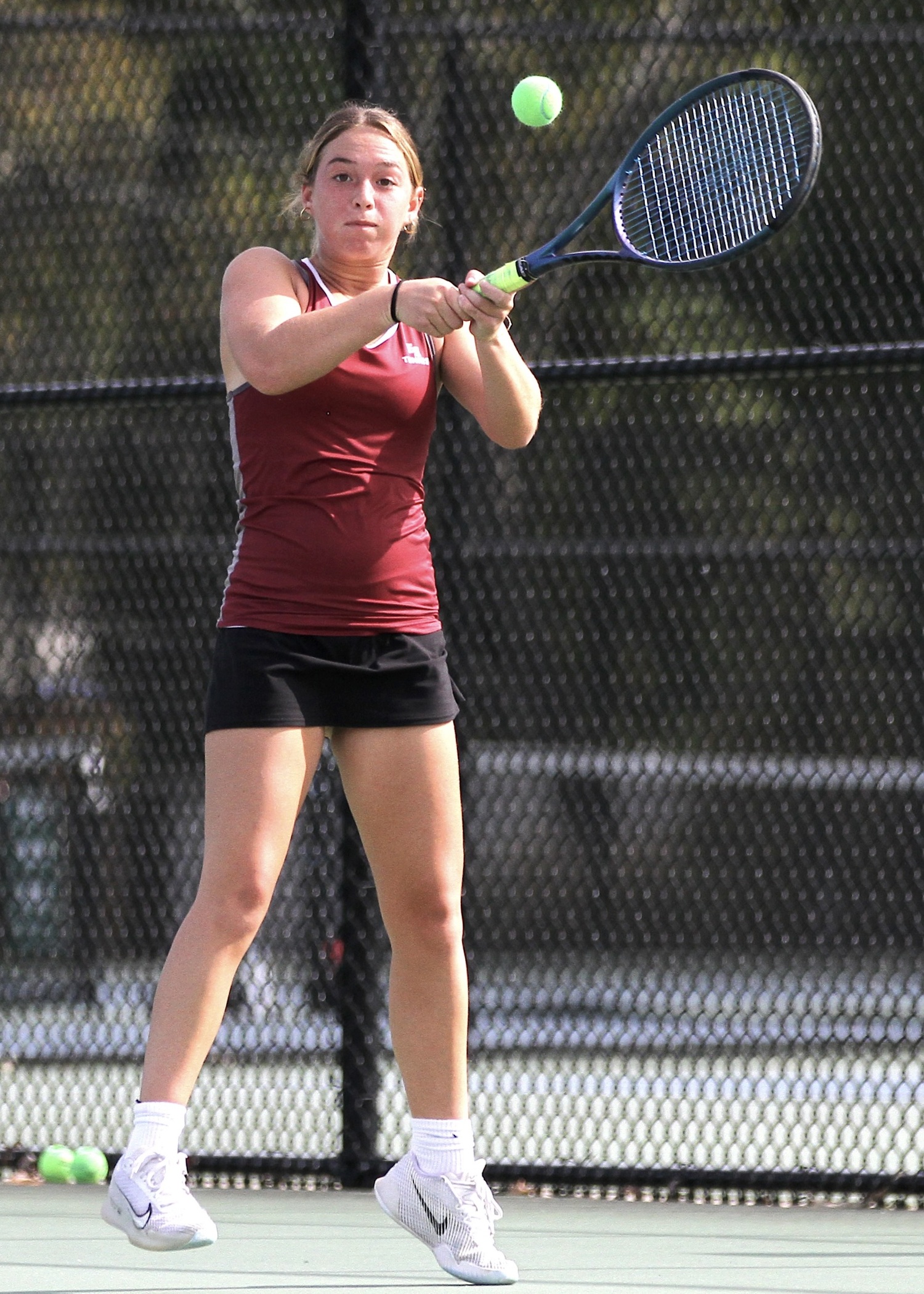 East Hampton senior Hailey Rigby pushes the ball back over the net. DESIRÉE KEEGAN