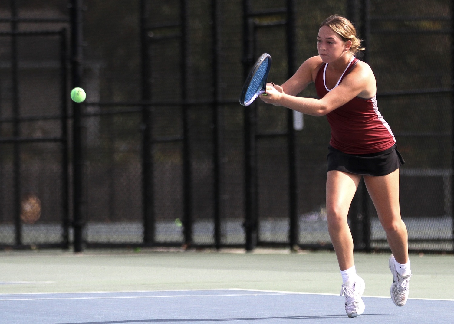 East Hampton senior Hailey Rigby returns a serve. DESIRÉE KEEGAN