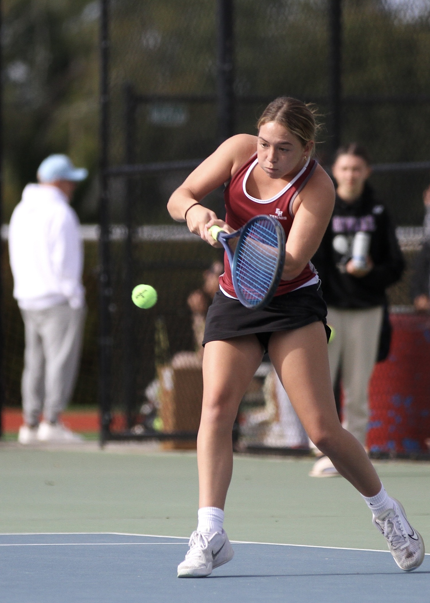 East Hampton senior Hailey Rigby returns a serve. DESIRÉE KEEGAN