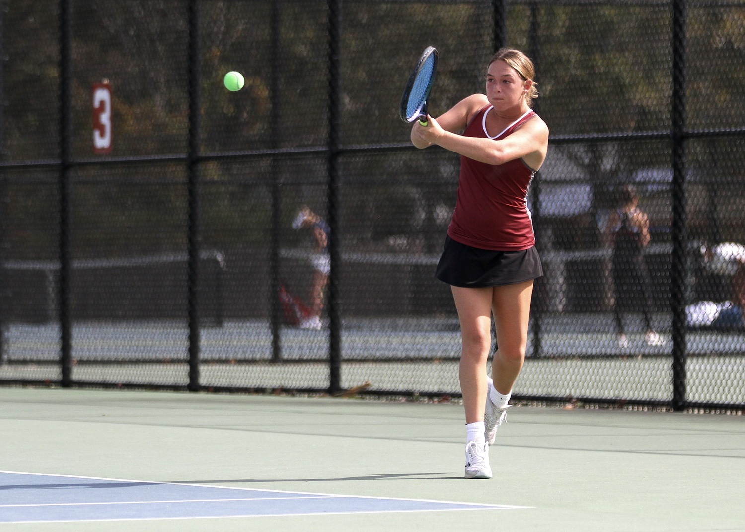 East Hampton senior Hailey Rigby sends the ball back over the net. DESIRÉE KEEGAN
