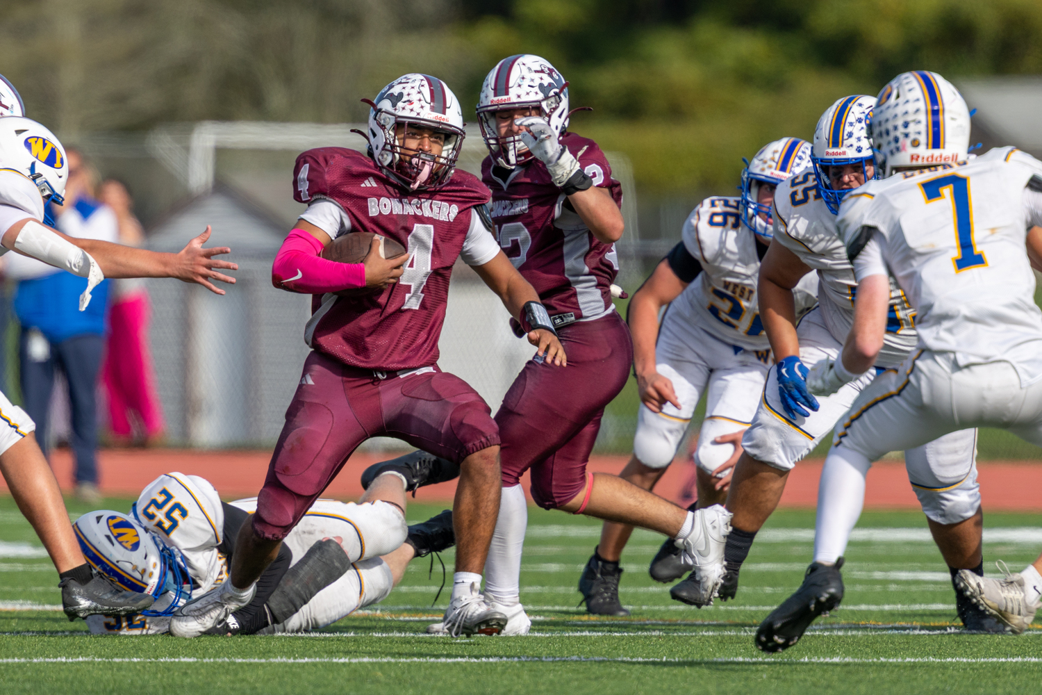 Bridgehampton senior Alex Davis get loose from a West Islip defender.  RON ESPOSITO