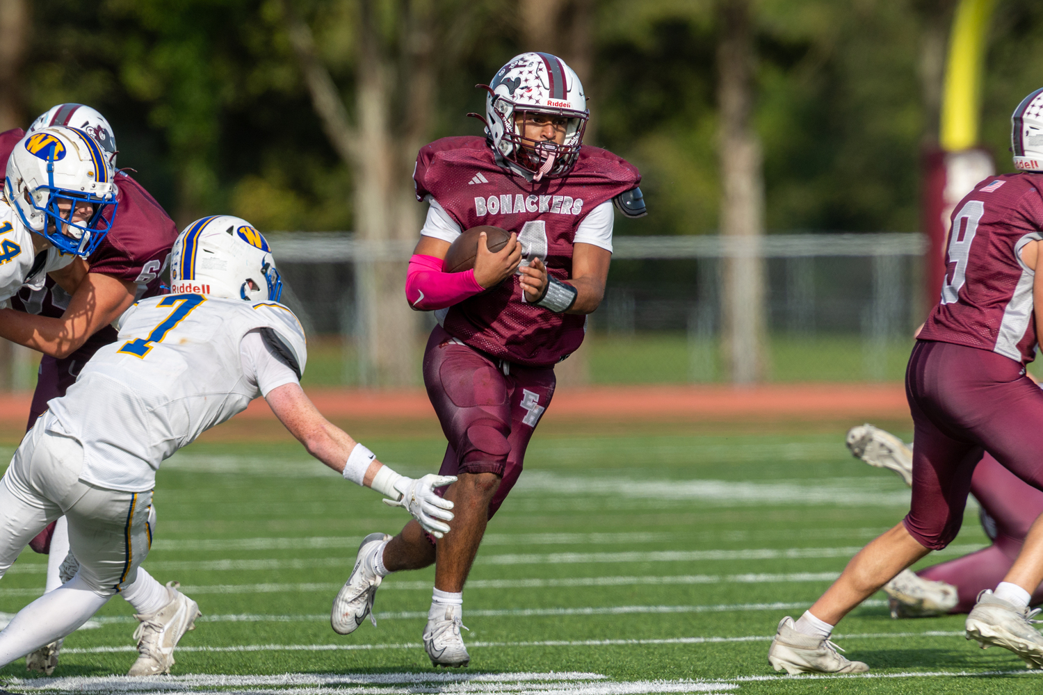Bridgehampton senior Alex Davis has a big hole to run through.  RON ESPOSITO