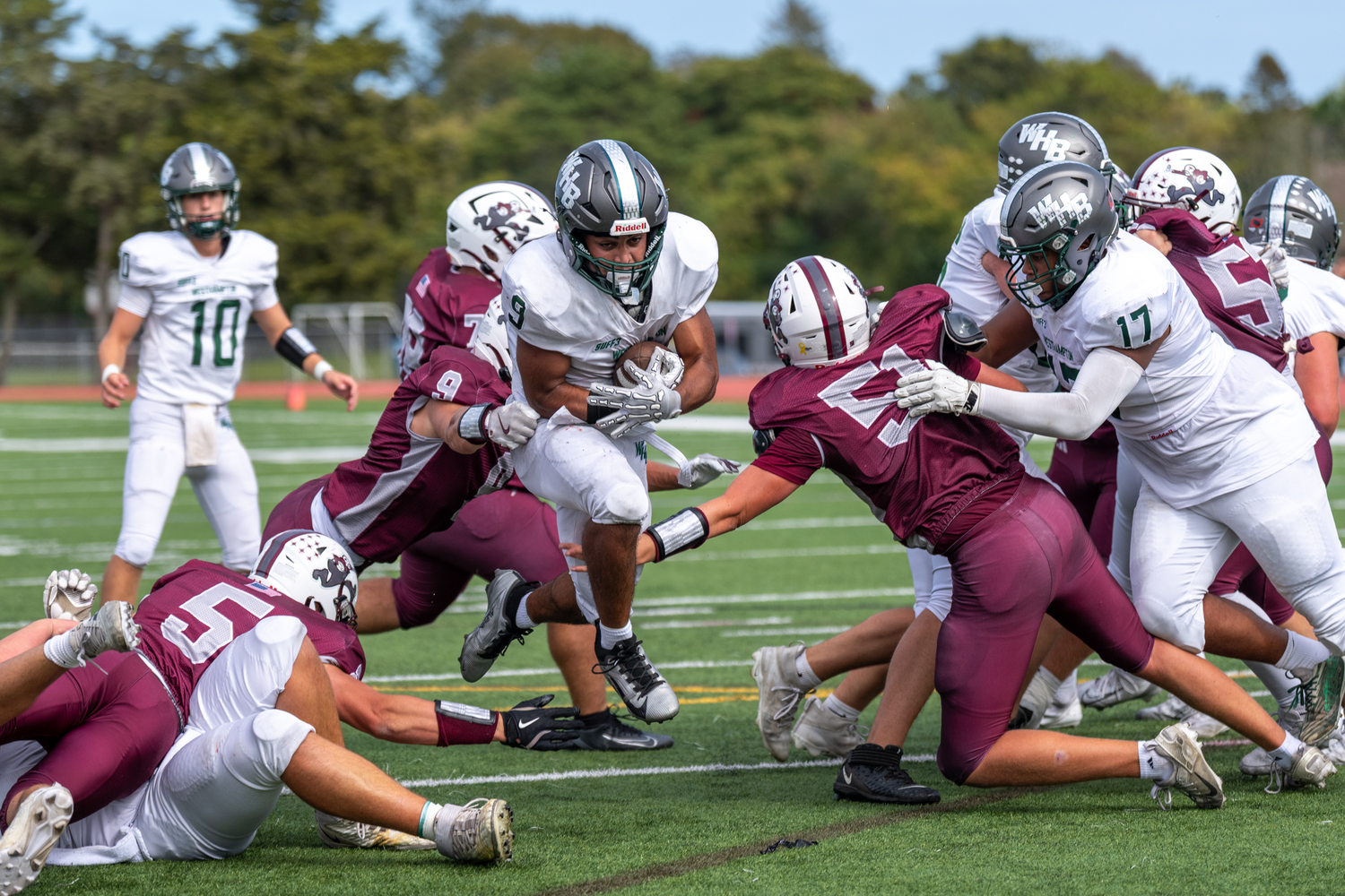 Westhampton Beach junior Nic Simone tries to power through Bonac's defensive front.  RON ESPOSITO