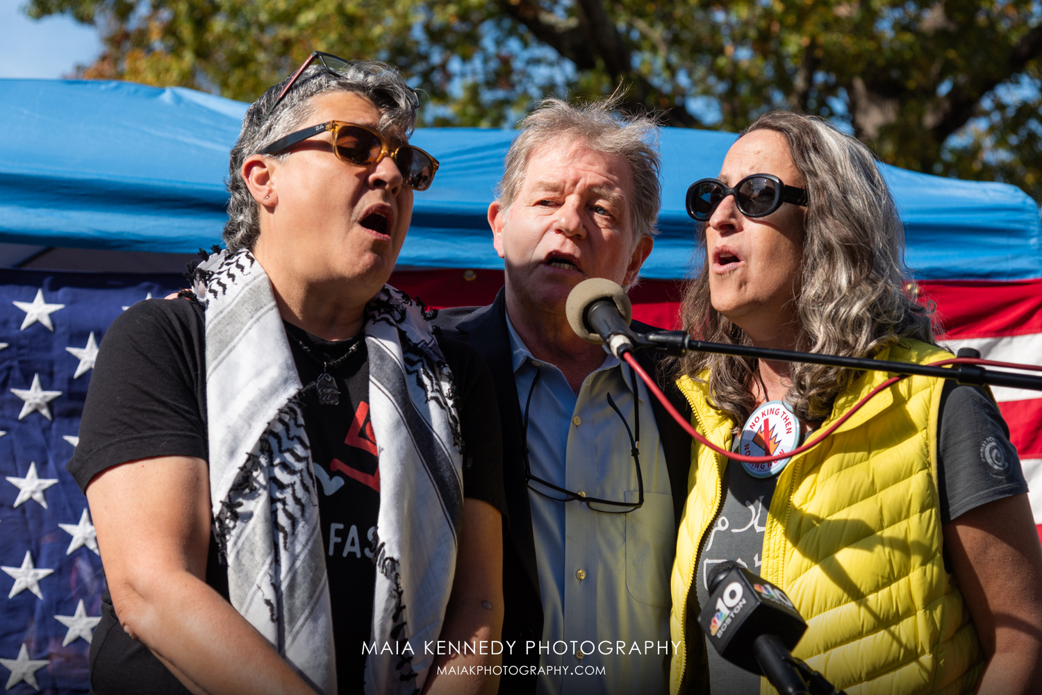 Emma's Revolution, Pat Humphries and Sandy O., performing during the No Kings event in Concord, Massachusetts. MAIA KENNEDY PHOTOGRAPHY