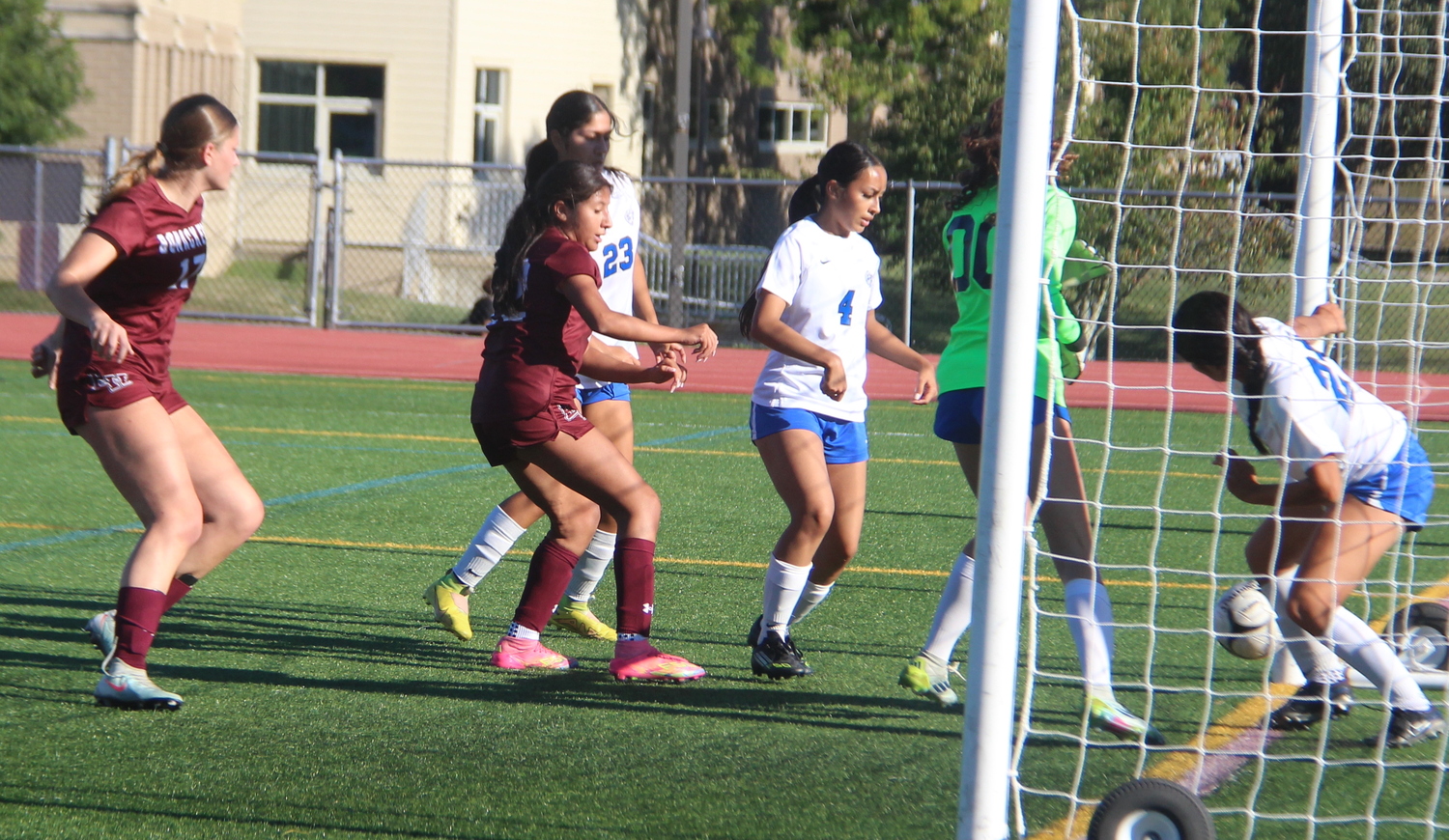 The first of four goals for Amy Torres went off a Riverhead defender.  JACK GRAVES