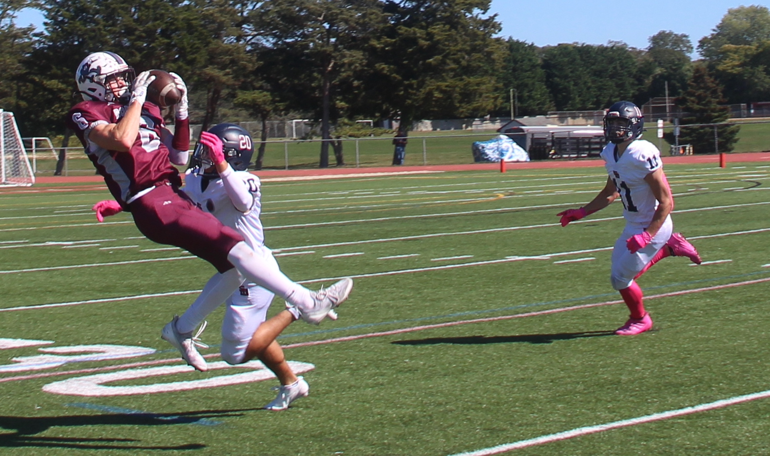 Livs Kuplins hauls in a pass from quarterback Theo Ball.  JACK GRAVES
