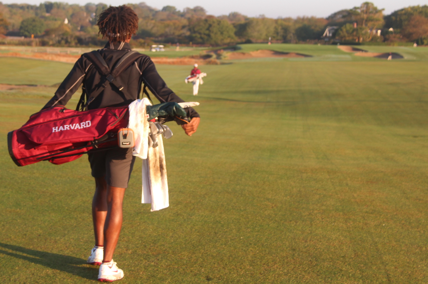 Morgan Riley of Harvard walking the greens at Maidstone.  JACK GRAVES