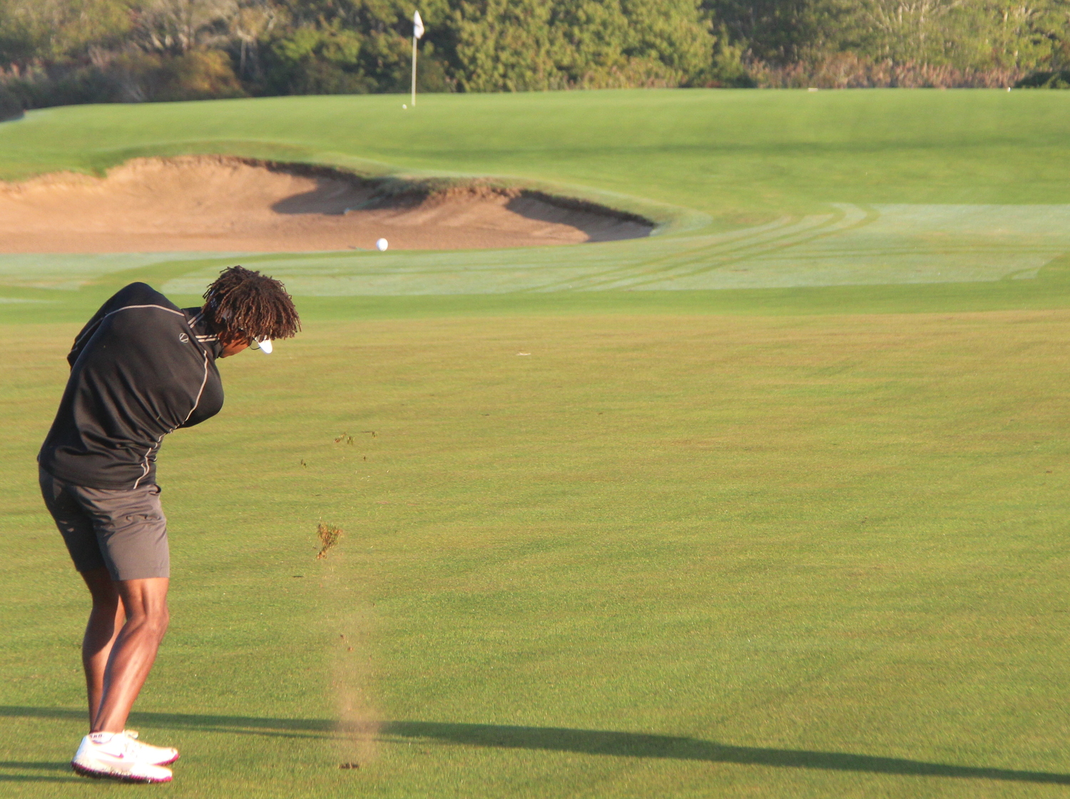 Morgan Riley of Harvard takes dead aim toward Maidstone's first green.  JACK GRAVES