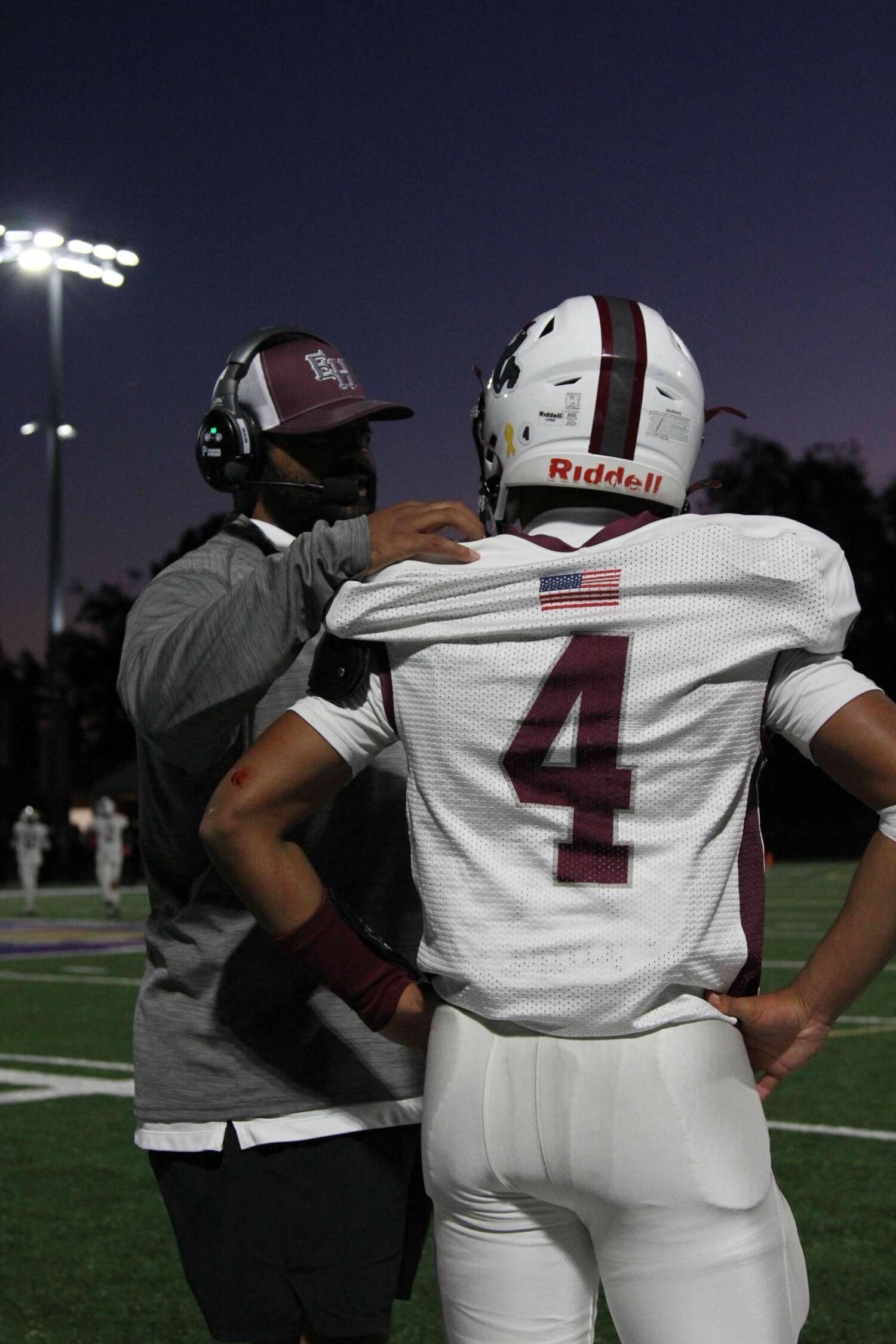 Assistant coach Jaron Greenidge goes over things with Bridgehampton senior Alex Davis.  JACEN SHEADES