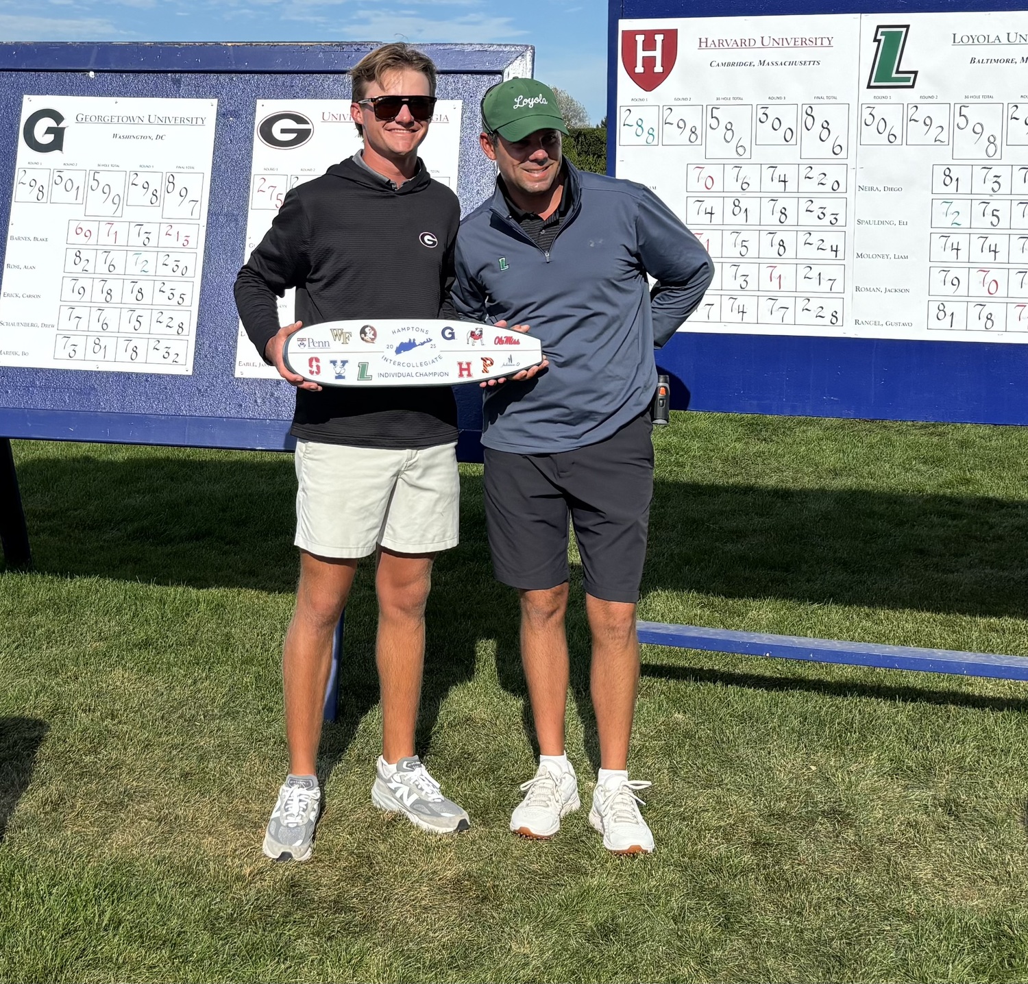 Carter Loflin of Georgia, the tourney’s low scorer, with head coach Chris Haack.  JACK GRAVES