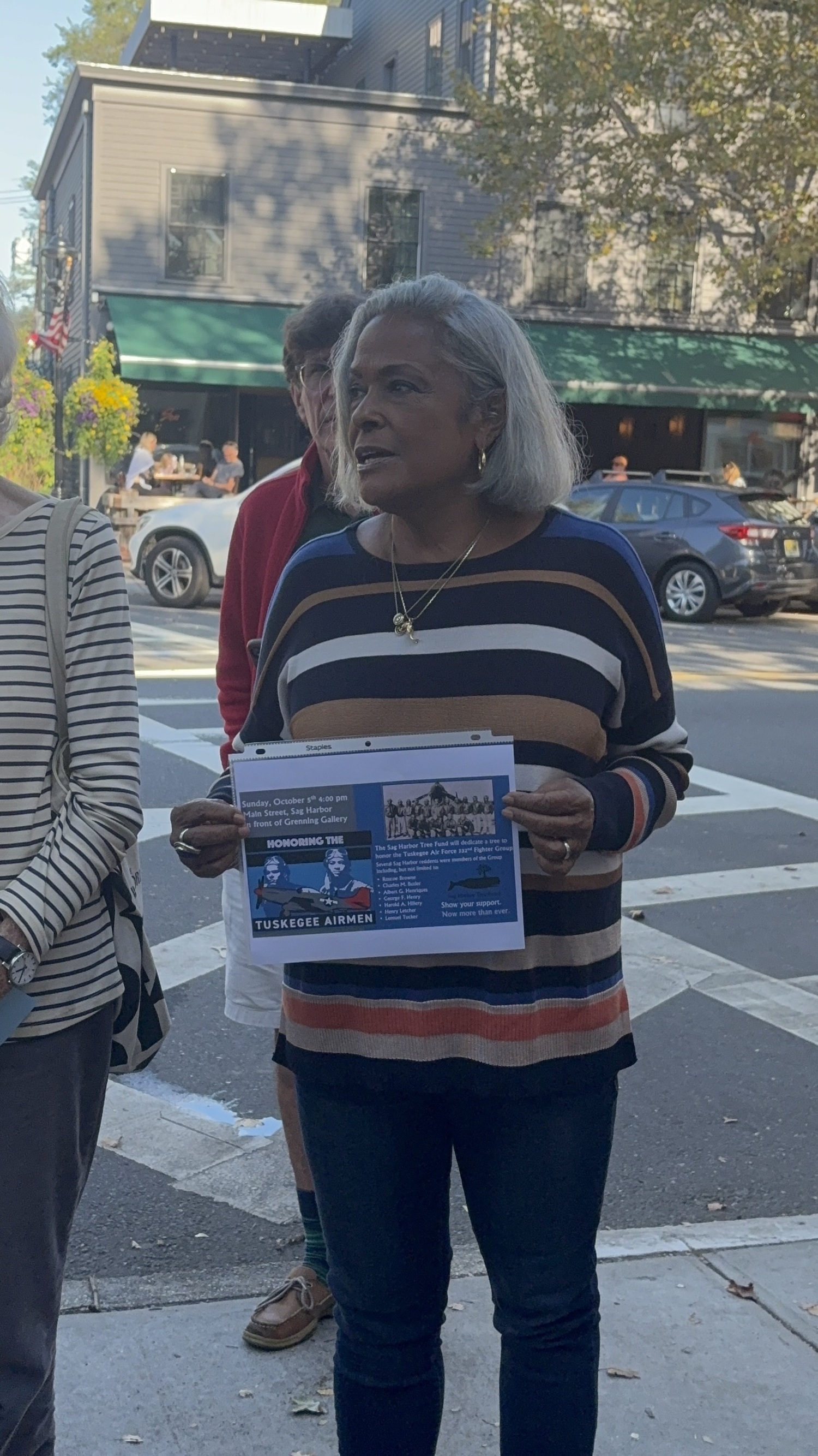 Sag Harbor residents gathered for a small ceremony on Main Street on Sunday to honor the memory of Sag Harbor residents who had served as Tuskegee Airmen, the unit that had the first pilots of color to serve in the U.S. military. Descendants of those veterans honored them as a ceremony dedicating a small tree on Main Street to them. CAILIN RILEY