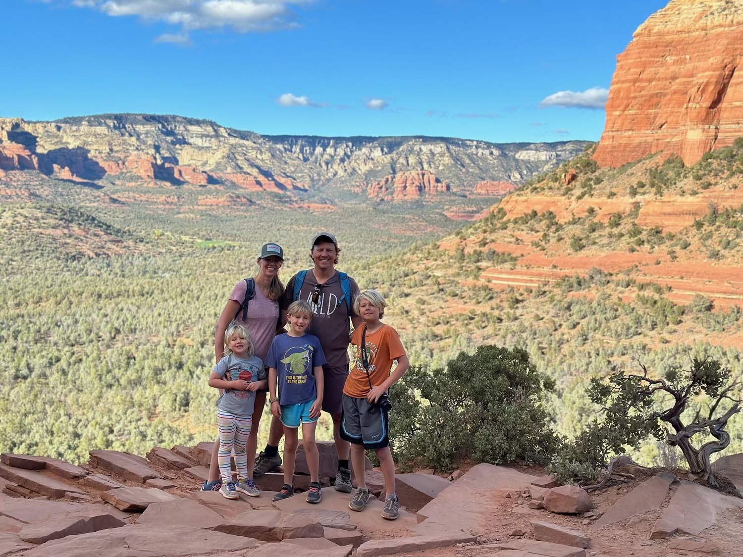 Jen Skilbred, her husband, Nate Woiwode, and their children at Coconino National Forest during their 15-month cross country trip.