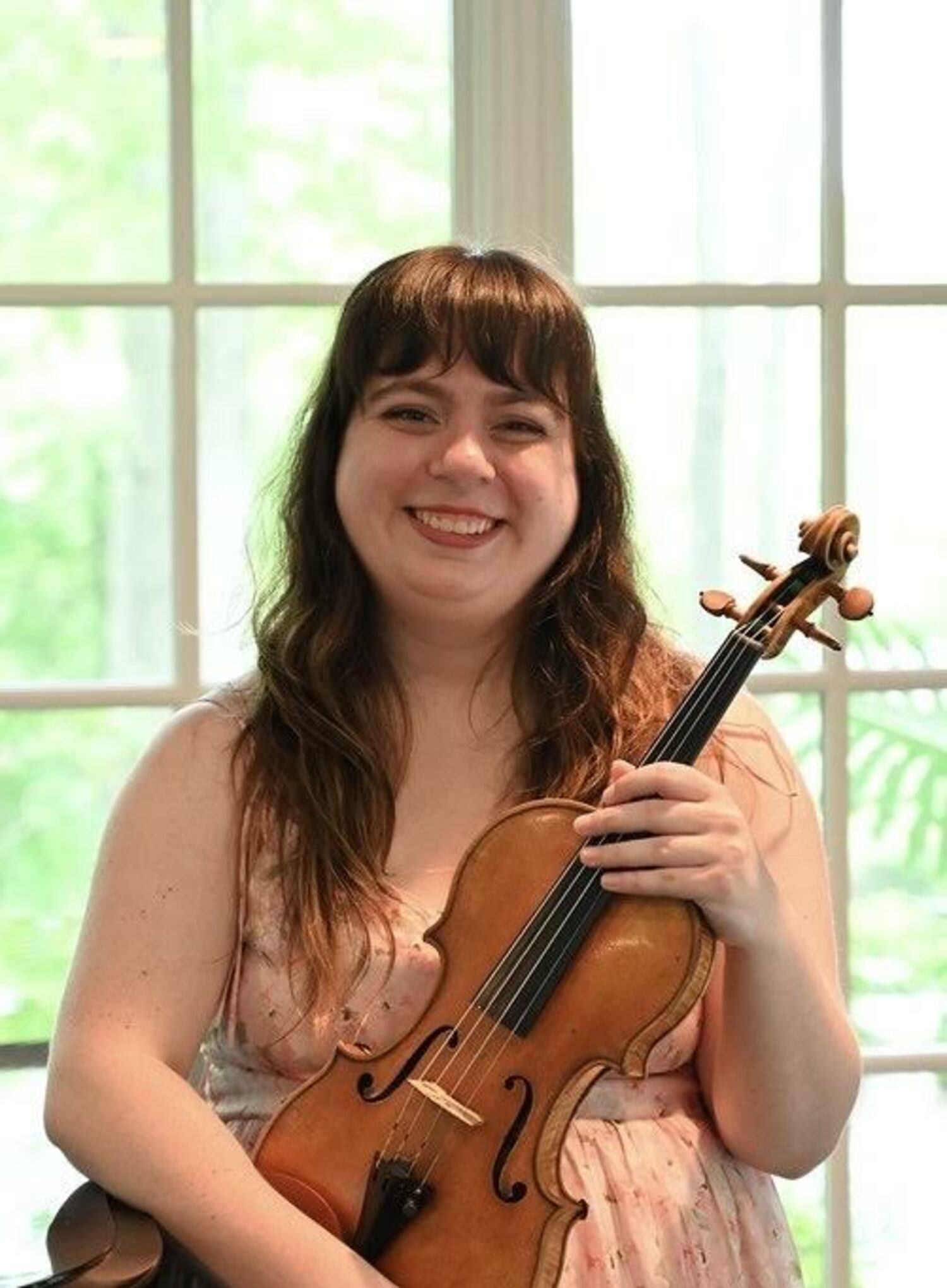 Violinist Jillian Johnson of Jiayi He's Harmonica & String Ensemble. COURTESY MONTAUK LIBRARY