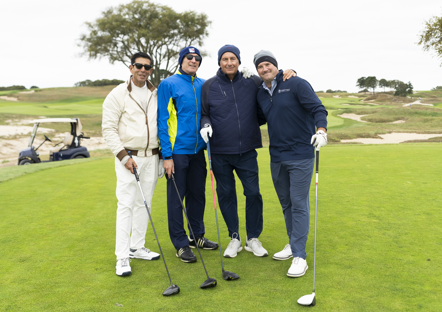 Nat Perlmutter with guests.  MARK SAGLIOCCO