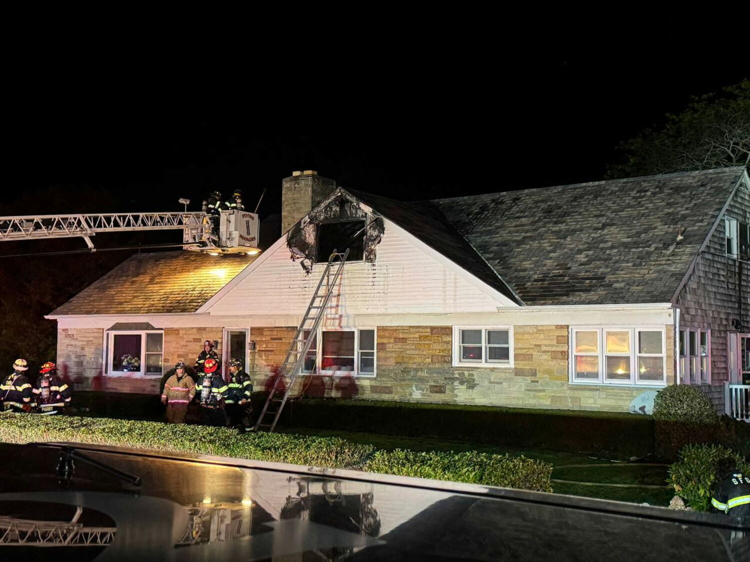 A man was trapped on the second floor of this burning house in Shinnecock Hills on Wednesday night but was saved by two quick-thinking Southampton Town Police officers. The Southampton Fire Department extinguished the fire. COURTESY SOUTHAMPTON FIRE DEPARTMENT