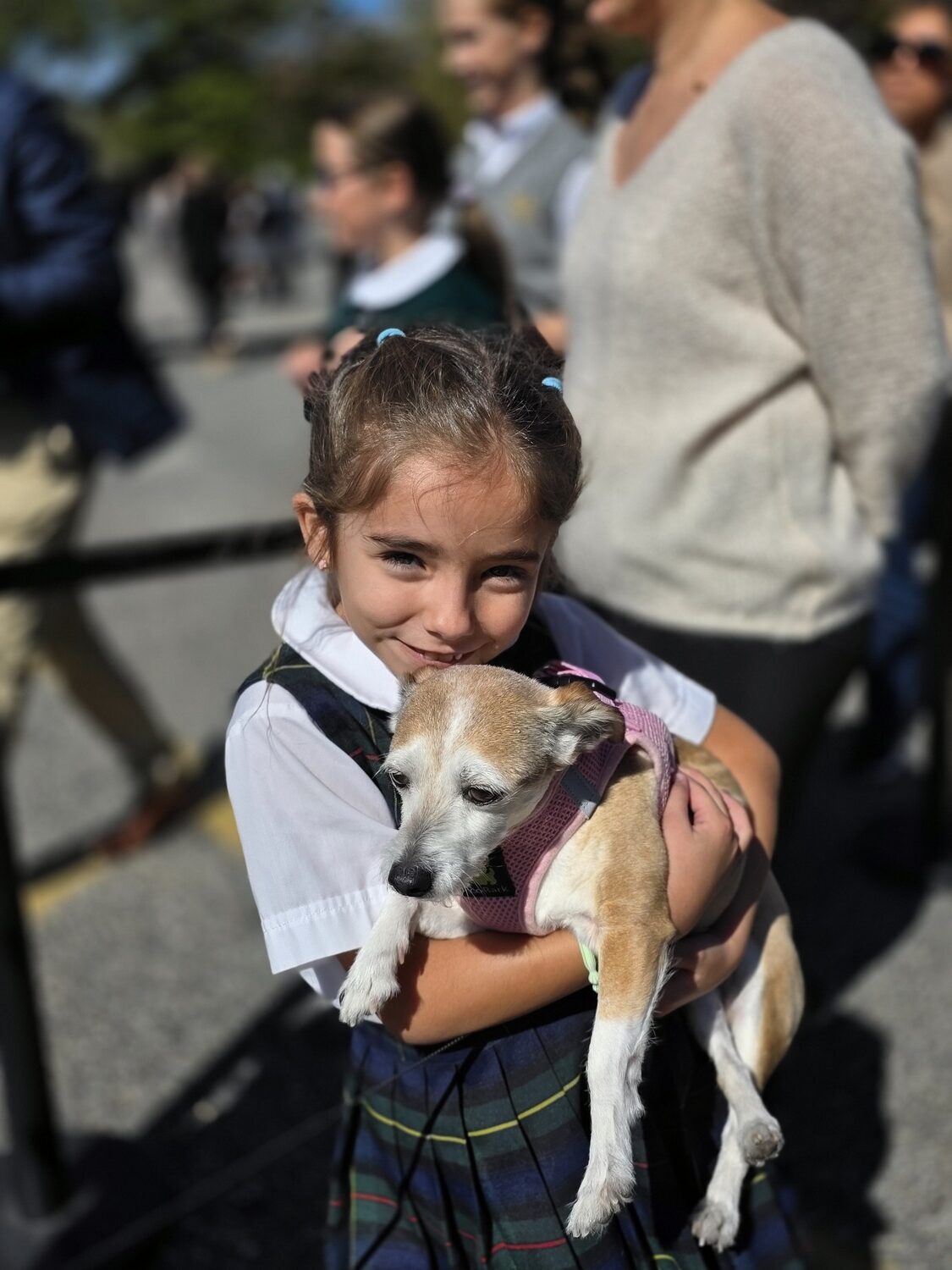 Our Lady of the Hamptons School recently held its annual Blessing of the Animals. Second-grader Maria Louriero brought her pet in for the occasion. COURTESY OUR LADY OF THE HAMPTONS SCHOOL