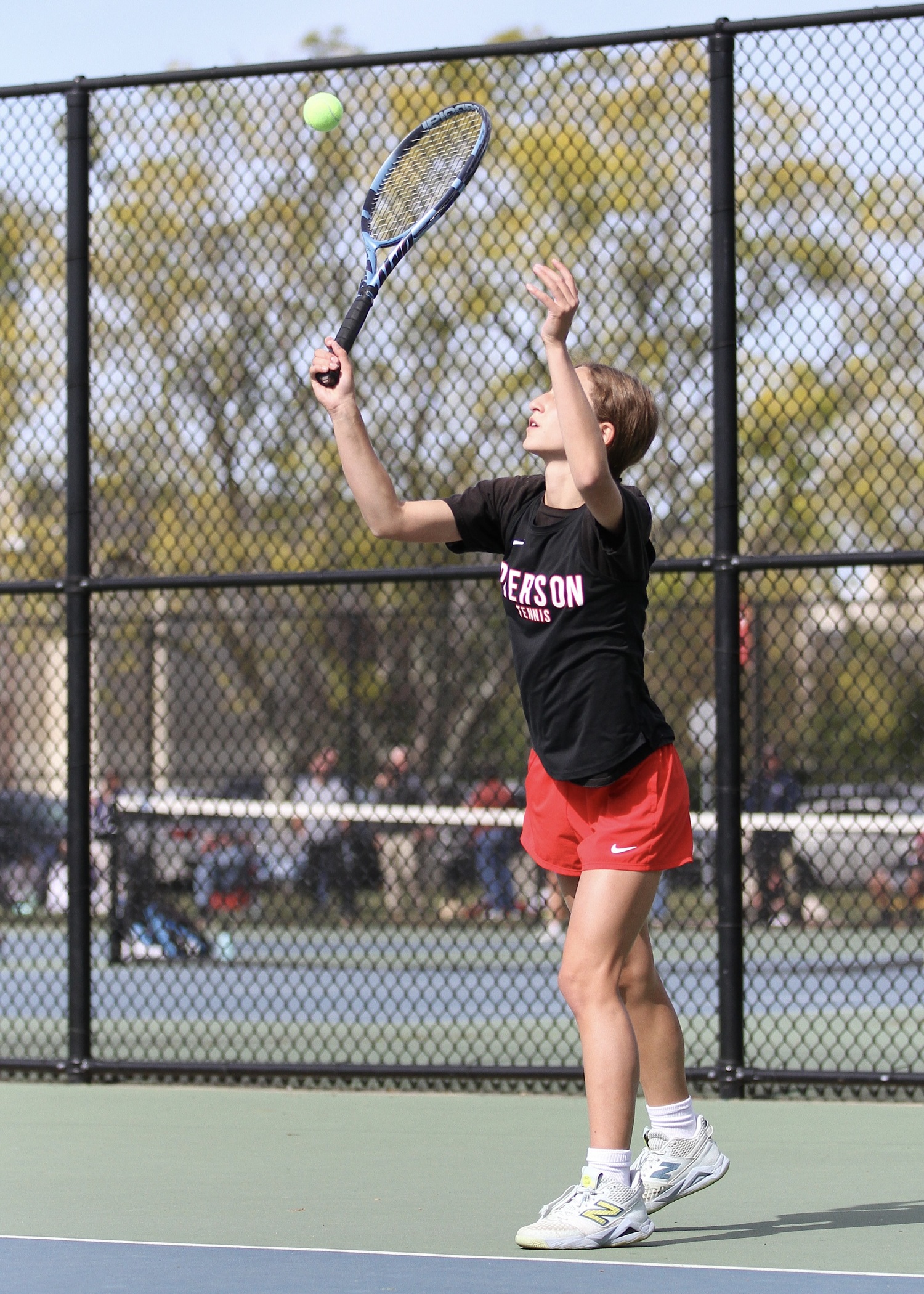 Pierson sophomore Molly Wolfson serves. DESIRÉE KEEGAN