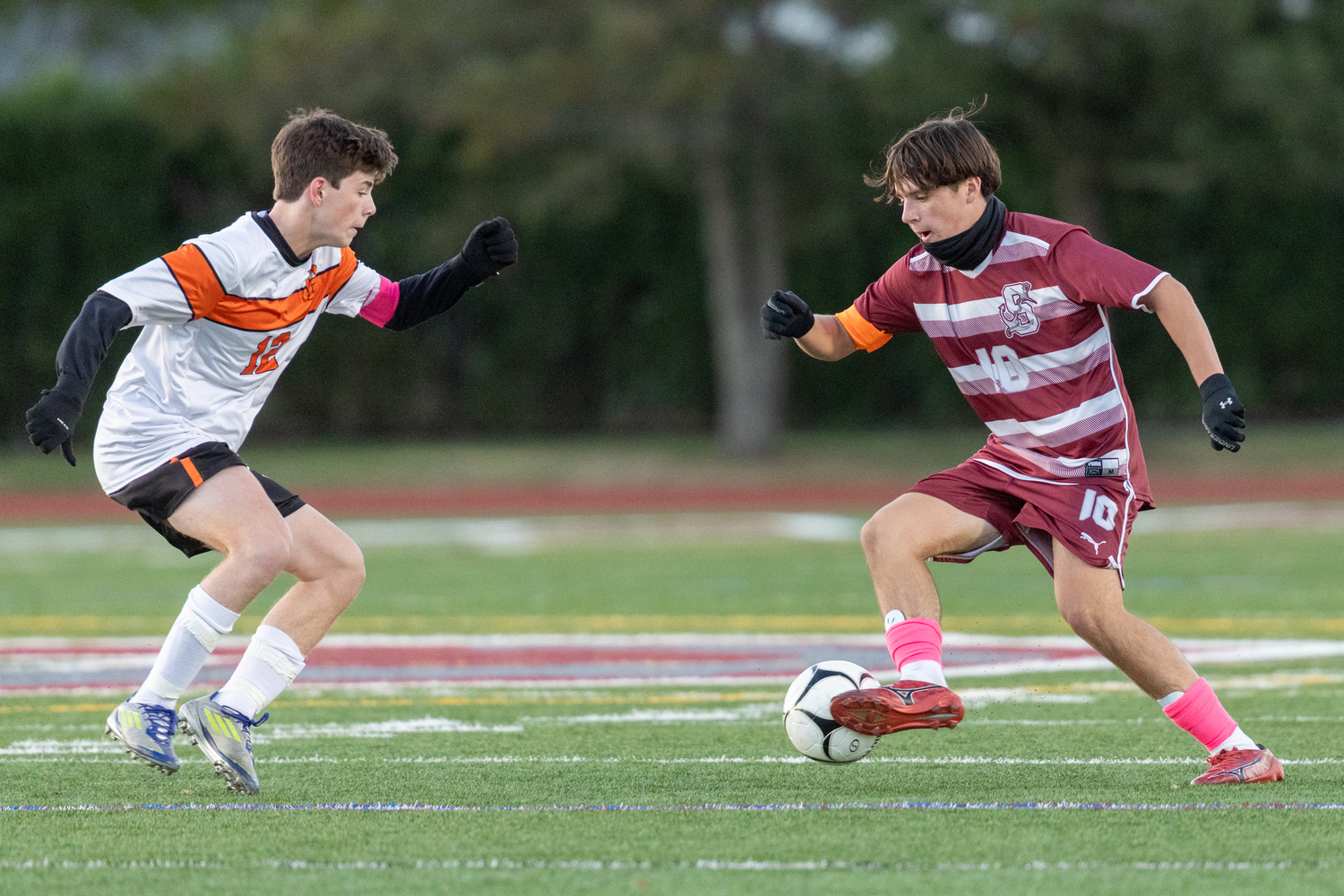 Southampton junior co-captain James Garvin takes on Babylon senior Daniel Murphy one-on-one.  RON ESPOSITO/SOUTHAMPTON SCHOOL DISTRICT