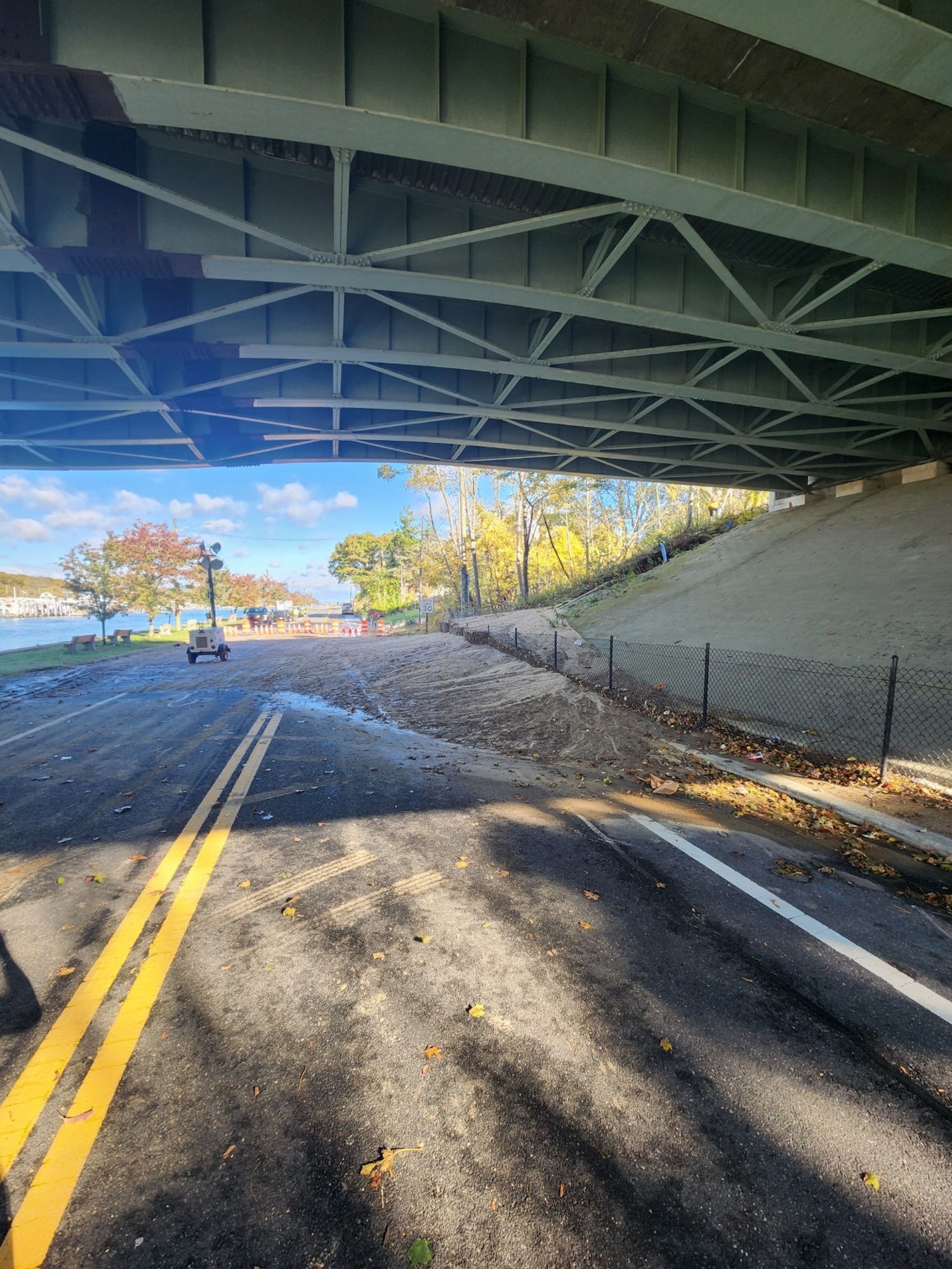 Heavy rainfall on Thursday night caused severe erosion beneath the westbound lanes of Sunrise Highway at the Shinnecock Canal, forcing the state Department of Transportation to close the roadway. Only very limited number of cars are being allowed to flow west on the highway using the road's shoulder. SOUTHAMPTON TOWN