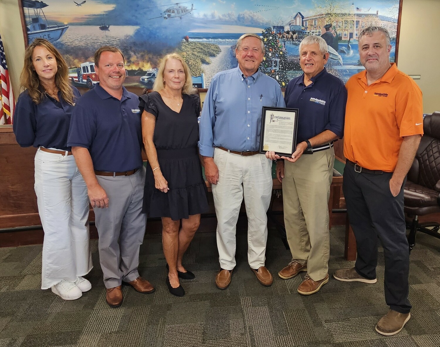 From left: Jill Carney, marketing manager, Sandpebble Project Management; Greg Russo, site project manager, Sandpebble; Diane McCarron, C.O.O., Sandpebble; Ralph Urban, mayor, Village of Westhampton Beach; Victor Canseco, president and CEO, Sandpebble Project Management; and Chris Barletta, operations manager, Sandpebble.