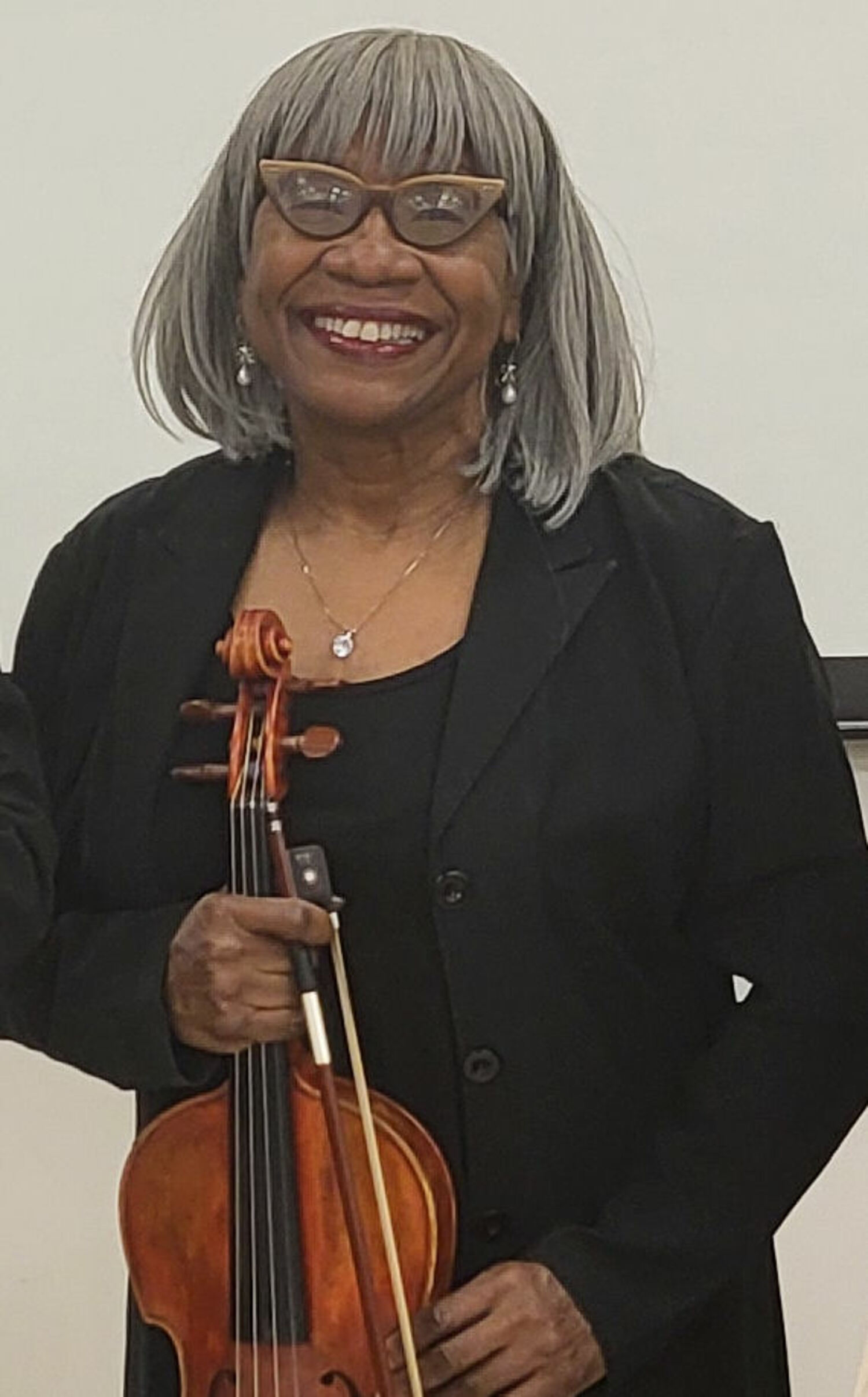 Violist Pamela Hamilton of Jiayi He's Harmonica & String Ensemble. COURTESY MONTAUK LIBRARY