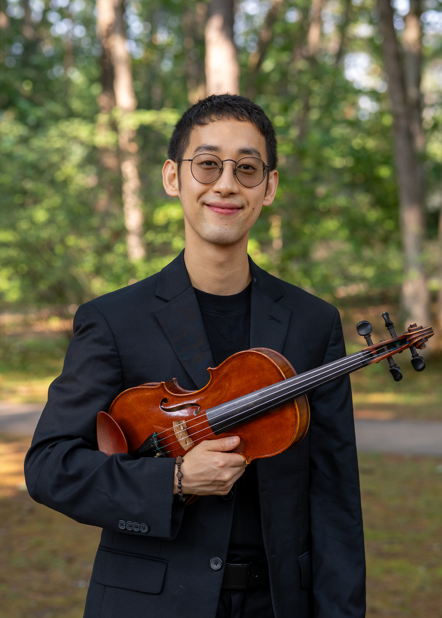 Violinist Martin Noh of Jiayi He's Harmonica & String Ensemble which comes to Montauk Library on November 9. COURTESY MONTAUK LIBRARY